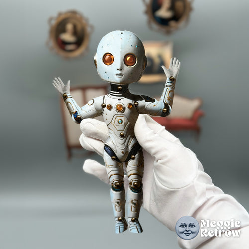 Cypher, a printable articulated paper doll. A pale blue robot with amber eyes and thin gold lines.