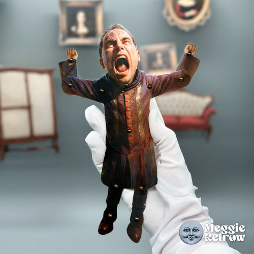 Wizard NOOBLY, a printable articulated paper doll. A yelling man in a long plum coat, fists raised.