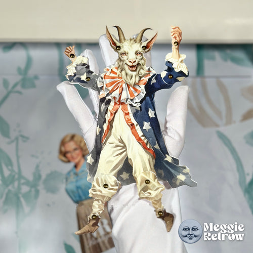 Rocky, a printable articulated paper doll. A bearded goat in a starry blue coat with a striped ruffle.