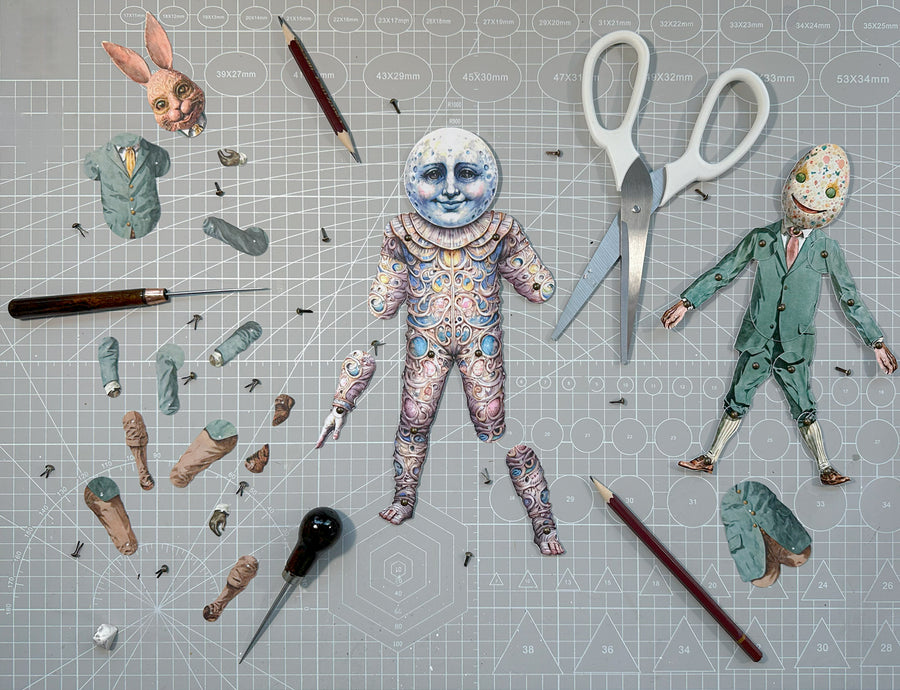 A doll on the cutting mat