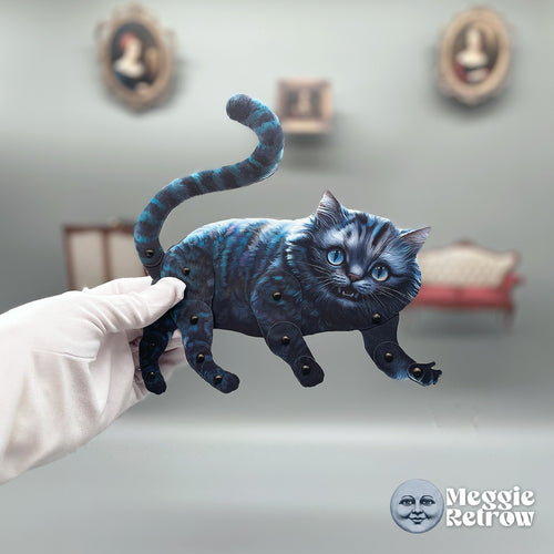 Cheshire Cat, a printable articulated paper doll. Dark blue stripes and a tail curled high.