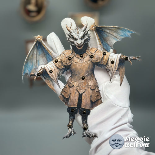 Guardian Gargoyle, a printable articulated paper doll. Horns, blue-gray wings, and bronze scale armor.