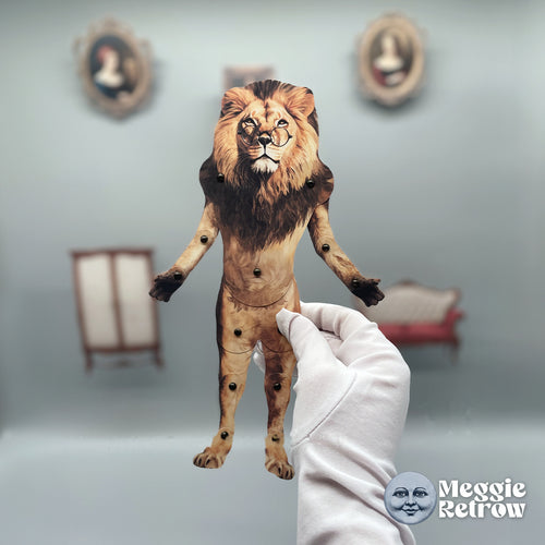 Lion, a printable articulated paper doll. A full mane and round wire glasses.