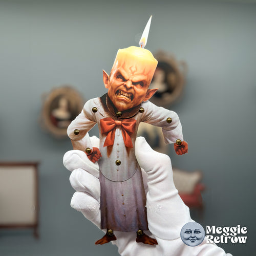Trondle, a printable articulated paper doll. A candle for a head and a white nightshirt with an orange bow.