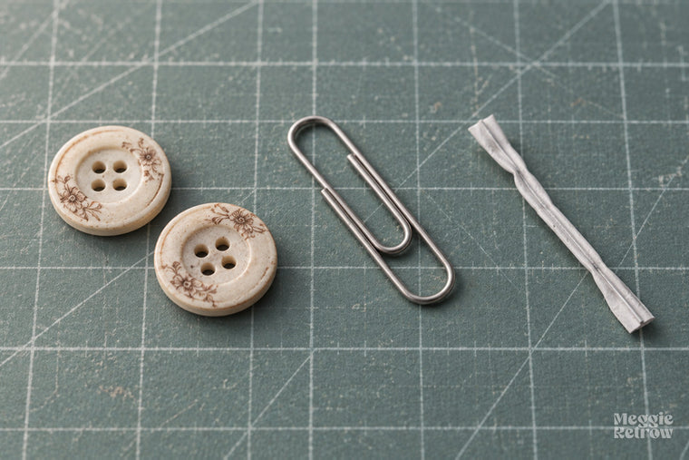 Buttons, paper clip, wire tie