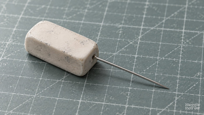 Needle in an eraser